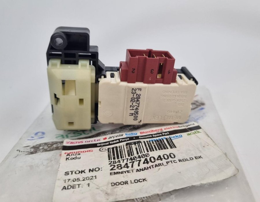 Замок люка пральної машини Beko 2847740400